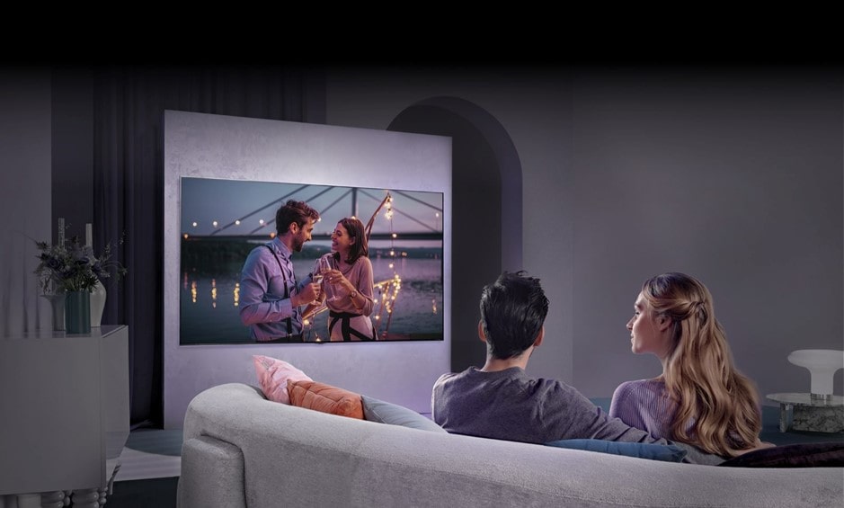 A couple watching LG television